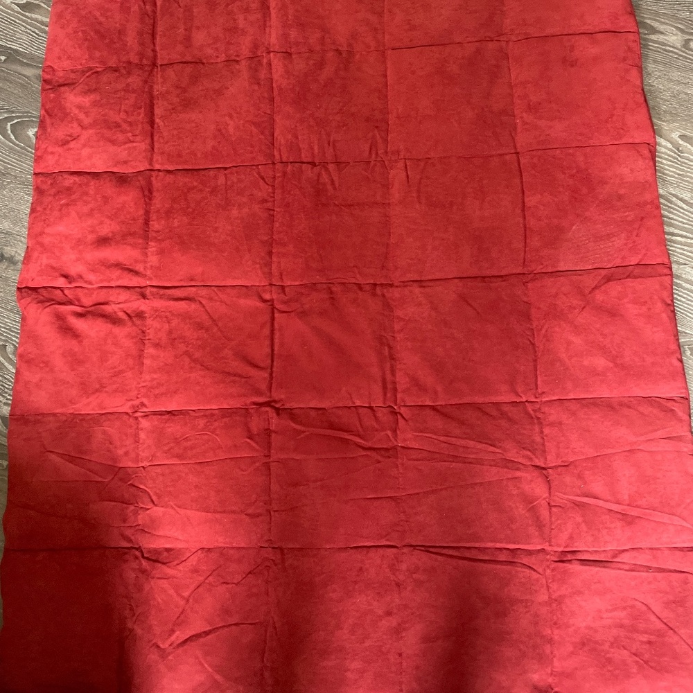 Beautiful spice coloured  down throw.